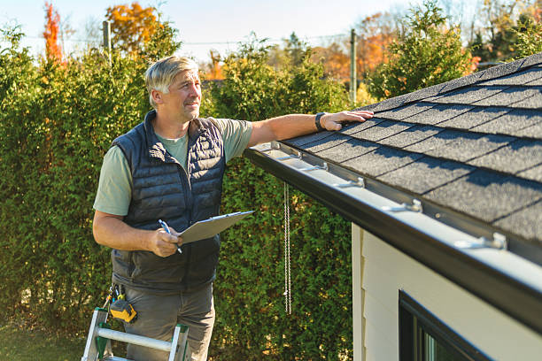 Professional Roof Replacement technician working in Wimbledon, ND